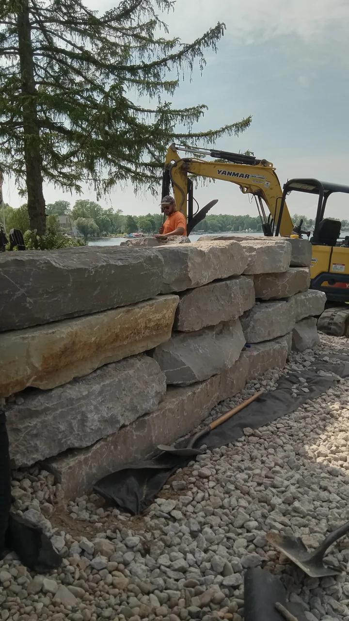 Drainage Behind a Retaining Wall — Weep Holes, Gravel, Drain Tile